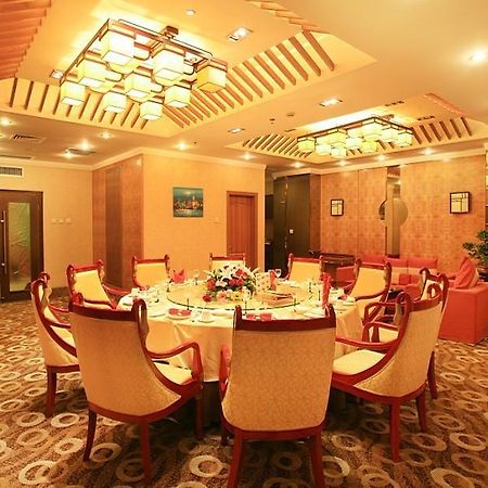 Xi'An Times Hotel Restaurante foto